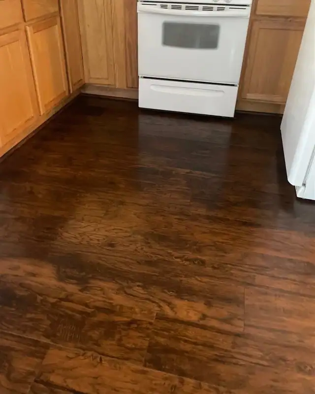 A polished dark hardwood floor in a Central Oregon kitchen